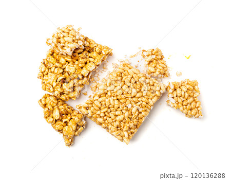 Puffed rice bar isolated, sweet wheat kozinaki, puff cereal block pieces, sugar crispy wheat bar, healthy popped dessert Puffed rice bar isolated, sweet wheat kozinaki, puff cereal block pieces, sugar crispy wheat bar, healthy popped dessert 120136288