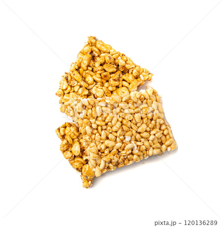 Puffed rice bar isolated, sweet wheat kozinaki, puff cereal block pieces, sugar crispy wheat bar, healthy popped dessert Puffed rice bar isolated, sweet wheat kozinaki, puff cereal block pieces, sugar crispy wheat bar, healthy popped dessert 120136289