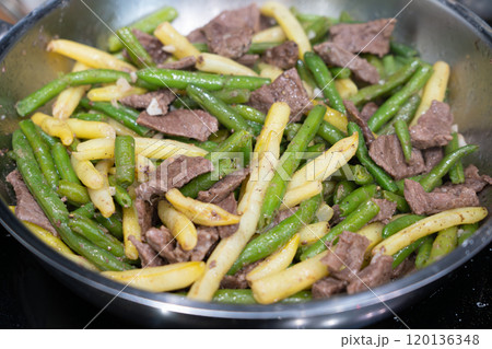 Stir Frying Beef with Green Yellow String Beans Closeup, Fried French Beans Mix with Meat, Asian Food Stir Frying Beef with Green Yellow String Beans Closeup, Fried French Beans Mix with Meat, Asian Food 120136348