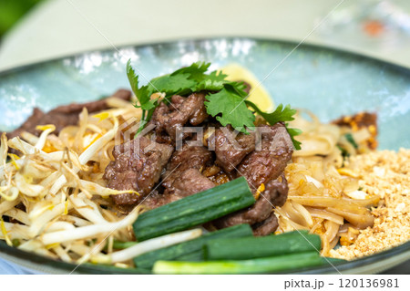 Pad thai,?phat thai, or?phad tha asian noodles, chinese rice pasta with meat in thailand restaurant table 120136981