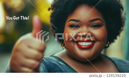 Confident plus size woman giving a thumbs up with a big smile for encouragement and motivation Confident plus size woman giving a thumbs up with a big smile for encouragement and motivation 120139220