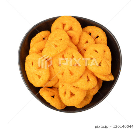 Corn puff snack isolated, crunchy cereal nosh, crispy yellow rice breakfast with paprika Corn puff snack isolated, crunchy cereal nosh, crispy yellow rice breakfast with paprika 120140044