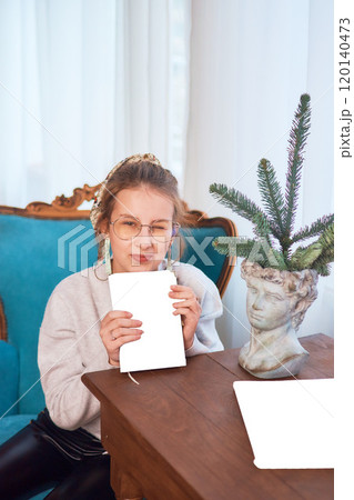 teenage girl reading a book sitting in an armchair, mockup teenage girl reading a book sitting in an armchair, mockup 120140473