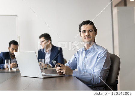 Positive confident business leader man using smartphone 120141005