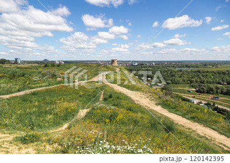 The tower of an ancient Bulgarian fortress on a high cliff on the banks of the Kama River, Elabuga, Tatarstan, Russian Federation The tower of an ancient Bulgarian fortress on a high cliff on the banks of the Kama River, Elabuga, Tatarstan, Russian Federation 120142395