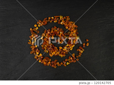 Amber stones, polished orange gemstones, natural Baltic amber gems, golden fossilized tree resin 120142705