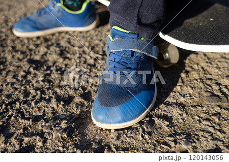 Children's anatomical shoes. A child skates in comfortable barefoot sneakers with a wide toe. Lots of room for the foot Children's anatomical shoes. A child skates in comfortable barefoot sneakers with a wide toe. Lots of room for the foot 120143056