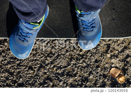 Children's anatomical shoes. A child skates in comfortable barefoot sneakers with a wide toe. Lots of room for the foot Children's anatomical shoes. A child skates in comfortable barefoot sneakers with a wide toe. Lots of room for the foot 120143058