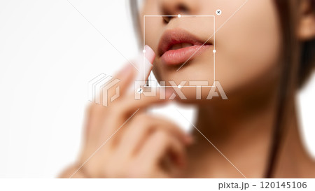 Close-up cropped image of woman applying lip balm, showcasing natural lips and smooth skin. Self-care, and skincare essentials. Close-up cropped image of woman applying lip balm, showcasing natural lips and smooth skin. Self-care, and skincare essentials. 120145106