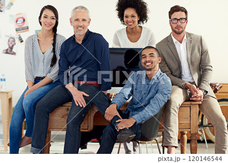 The best in any business. Shot of a group of creative professionals working in an office. 120146544