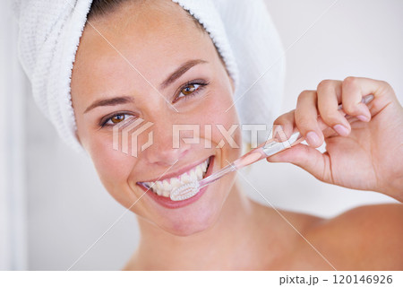 Its all about being hygienic. Portrait of a beautiful woman brushing her teeth. 120146926