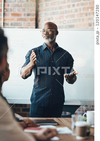 Leadership starts with self-confidence. Shot of a businessman giving a presentation to his colleagues in a boardroom. Leadership starts with self-confidence. Shot of a businessman giving a presentation to his colleagues in a boardroom. 120147280