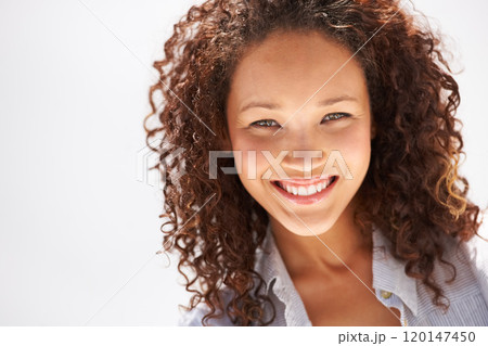 Fresh-faced and naturally beautiful. Cropped view of a naturally gorgeous young woman smiling at you. 120147450