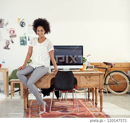 Ill design your ideas. Cropped shot of an attractive young woman in her office. Ill design your ideas. Cropped shot of an attractive young woman in her office. 120147572
