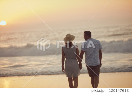 Say youll spend forever with me...Rearview shot of a mature couple spending quality time on the beach. Say youll spend forever with me...Rearview shot of a mature couple spending quality time on the beach. 120147618