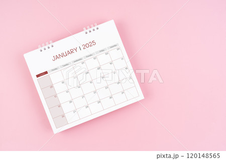 Top view on January desk calendar for 2025 year on pink background. 120148565