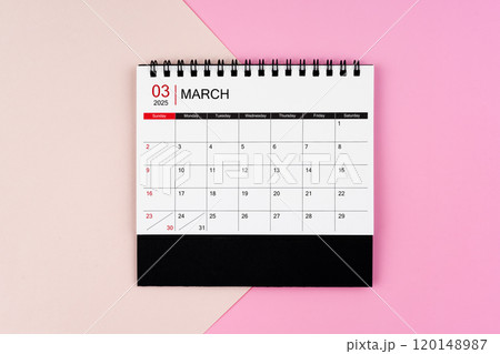 March 2025 desk calendar on pink background. Page of annual monthly calendar for your plan. 120148987