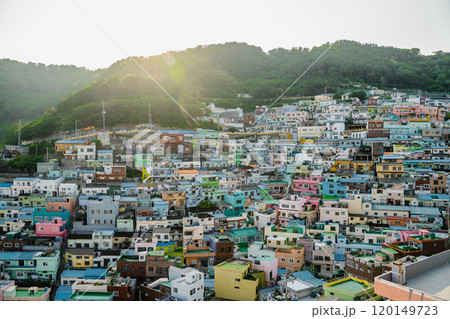 The iconic Ferris wheel amidst the picturesque landscapes during sunset 120149723