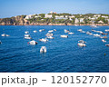 Yachts Anchored Along the Spanish Coastline Mediterranean Seaside View.vibrant photo of yachts and 120152770