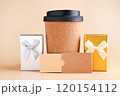 Eco-Friendly Coffee Cup with Gift Boxes Minimalist Holiday Gift Concept. tylish image featuring an 120154112