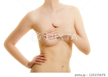 Woman covering her breast with hands Woman covering her breast with hands 120155679
