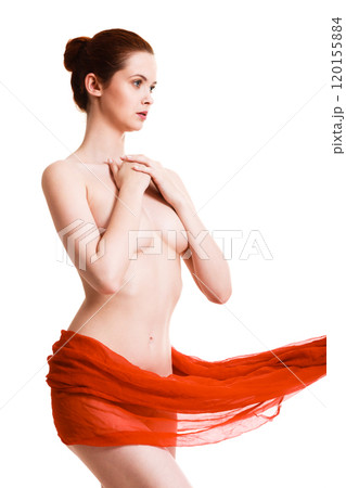 Woman with red textile on hips covering her breast Woman with red textile on hips covering her breast 120155884