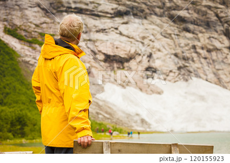 man tourist in norwegian mountains man tourist in norwegian mountains 120155923
