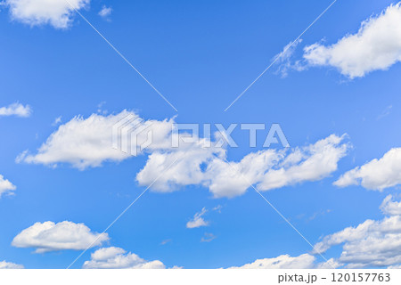 White clouds in a bright blue sky. The beauty of the nature White clouds in a bright blue sky. The beauty of the nature 120157763
