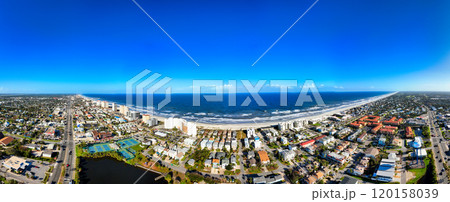 Jacksonville Beach aka JAX Beach - Here is an aerial view showcasing a vibrant city beside the ocean 120158039