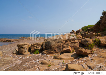 Rocky Coastal Beach with Clear Blue Sky 120160099