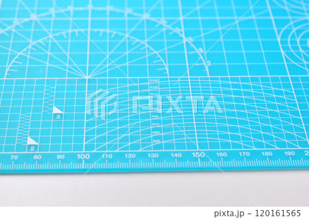 blue cutting mat board on white background with line and scale measure guide pattern for object art blue cutting mat board on white background with line and scale measure guide pattern for object art 120161565