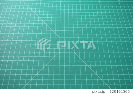 green cutting mat board background with line and scale measure guide pattern for object art green cutting mat board background with line and scale measure guide pattern for object art 120161566
