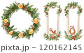 A festive wreath decorated with oranges and greenery, alongside two framed images of owls nestled among holly and festive elements. 120162145