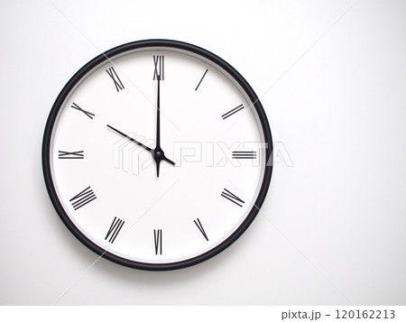 Clock Showing 22.00 or 10.00 with Roman Numerals. Simple Round Clock for Concepts of Time Management and Scheduling. 120162213