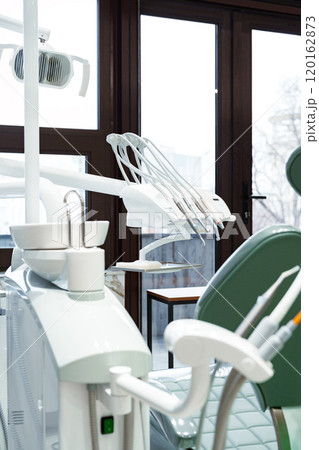 Modern dental clinic interior with advanced equipment Modern dental clinic interior with advanced equipment 120162873
