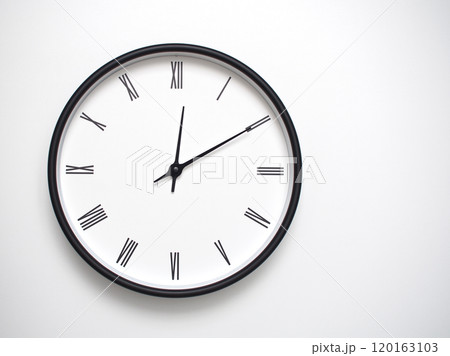 Clock Showing 12.10 or 00.10 with Roman Numerals. Simple Round Clock for Concepts of Time Management and Scheduling. 120163103