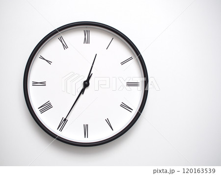Clock Showing 12.35 or 00.35 with Roman Numerals. Simple Round Clock for Concepts of Time Management and Scheduling. 120163539