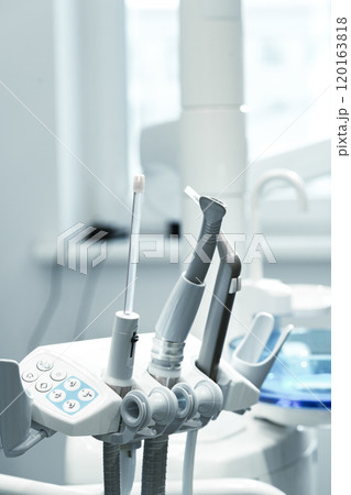 Dental equipment setup in a modern clinic with tools 120163818