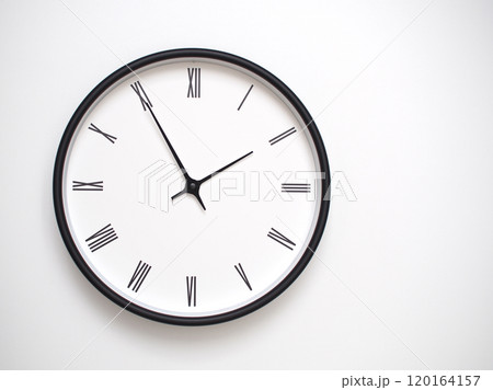 Clock Showing 13.55 or 01.55 with Roman Numerals. Simple Round Clock for Concepts of Time Management and Scheduling. Clock Showing 13.55 or 01.55 with Roman Numerals. Simple Round Clock for Concepts of Time Management and Scheduling. 120164157