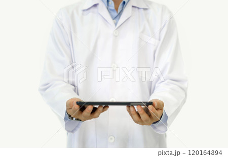 A doctor in a white lab coat holding tablet computer with his hand. Portrait on white background, studio shot. 120164894