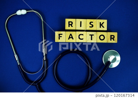 Risk Factor alphabet letters with stethoscope top view on blue background 120167314