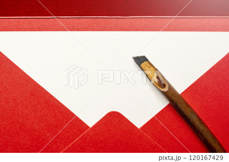 Calligraphy reeds with red envelope and white card Calligraphy reeds with red envelope and white card 120167429