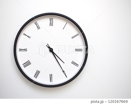 Clock Showing 16.25 or 04.25 with Roman Numerals. Simple Round Clock for Concepts of Time Management and Scheduling. 120167669