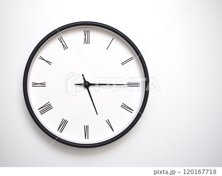 Clock Showing 17.15 or 05.15 with Roman Numerals. Simple Round Clock for Concepts of Time Management and Scheduling. 120167718