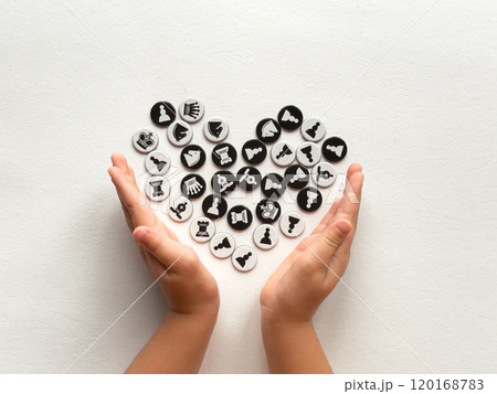 Hands holding chess pieces heart shape 120168783