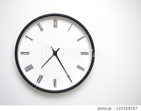 Clock Showing 19.25 or 07.25 with Roman Numerals. Simple Round Clock for Concepts of Time Management and Scheduling. 120169587