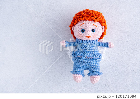 Knitted children's toy. Boy angel in a blue suit. Crochet. 120171094