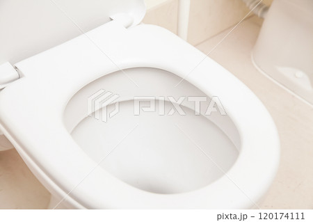 White Toilet Bowl. Close-up. Combating Unpleasant Odors of fresh toilet. Mock up Toilet freshener with highly concentrated aromatic oils White Toilet Bowl. Close-up. Combating Unpleasant Odors of fresh toilet. Mock up Toilet freshener with highly concentrated aromatic oils 120174111