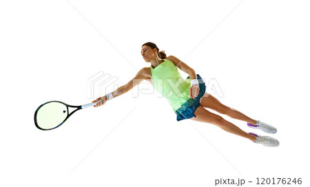 Player extends her arm, preparing for high volley. Woman holds racket with determined expression, fully immersed in game against white studio background. Player extends her arm, preparing for high volley. Woman holds racket with determined expression, fully immersed in game against white studio background. 120176246