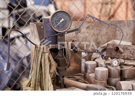 Industrial re-purposing. Cropped shot of a pile of equipment and scrap metal. 120176939
